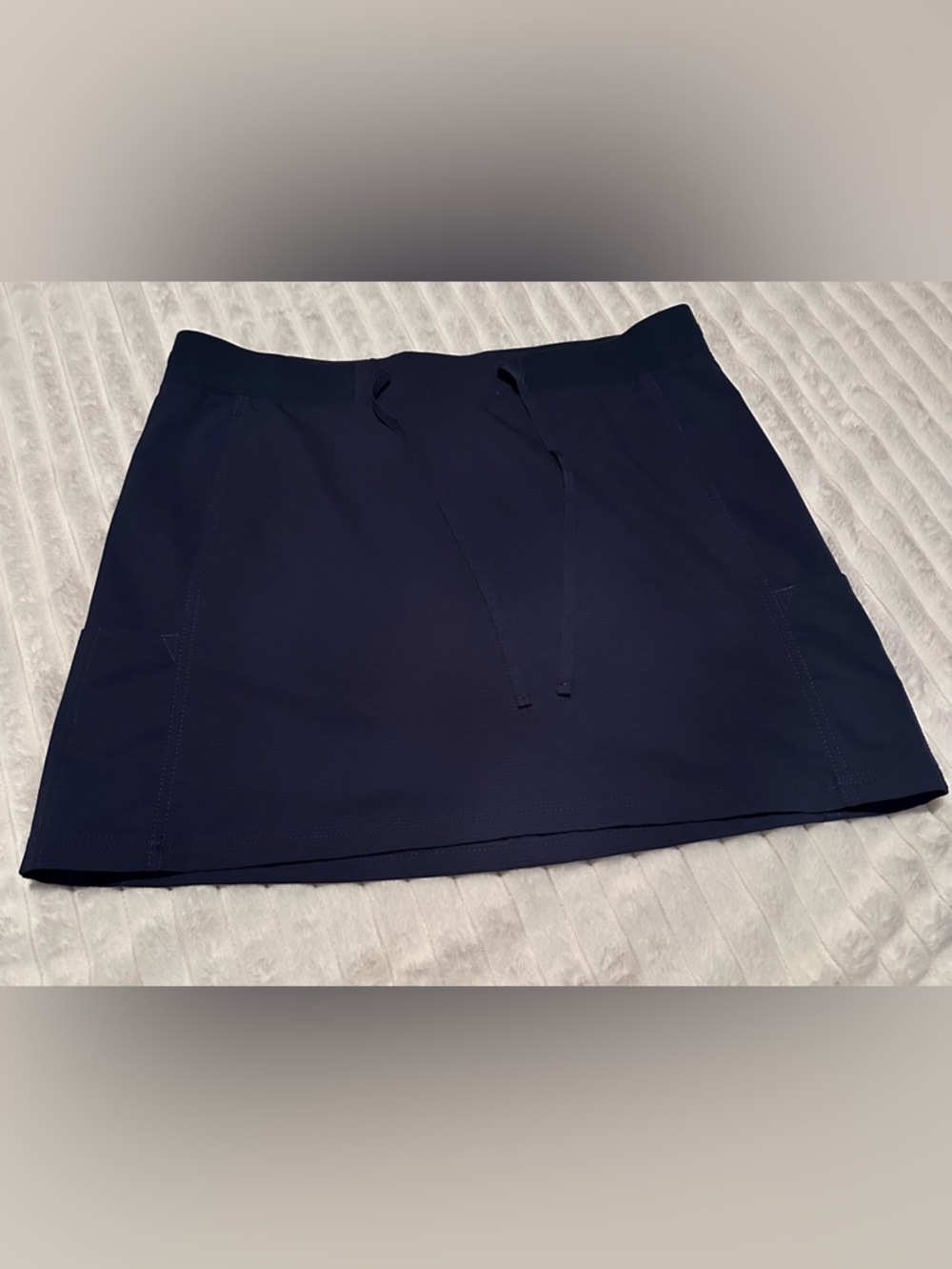 Riders by Lee blue athletic pull-on skirt with pink logo accent